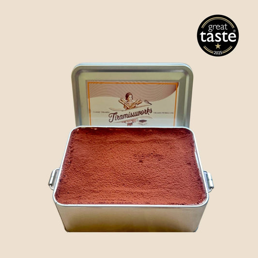  Premium halal tiramisu in open tin, rich cocoa top, Great Taste Award winner, alcohol-free dessert handmade in UK with fresh delivery.
