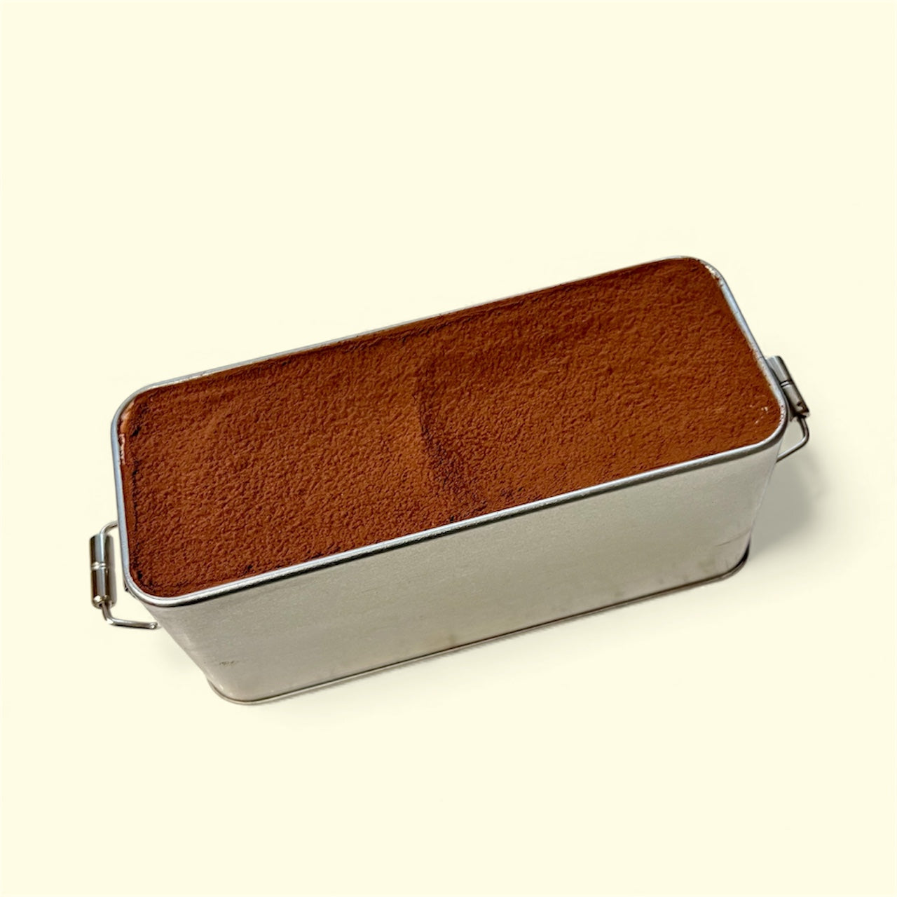 Tiramisu Duo Box 310g Classic & Pistachio, delicious dessert topped with cocoa powder, alcohol-free and halal-certified.